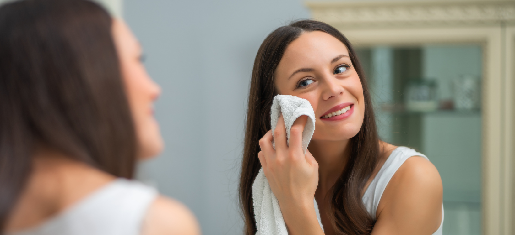 Woman washing face