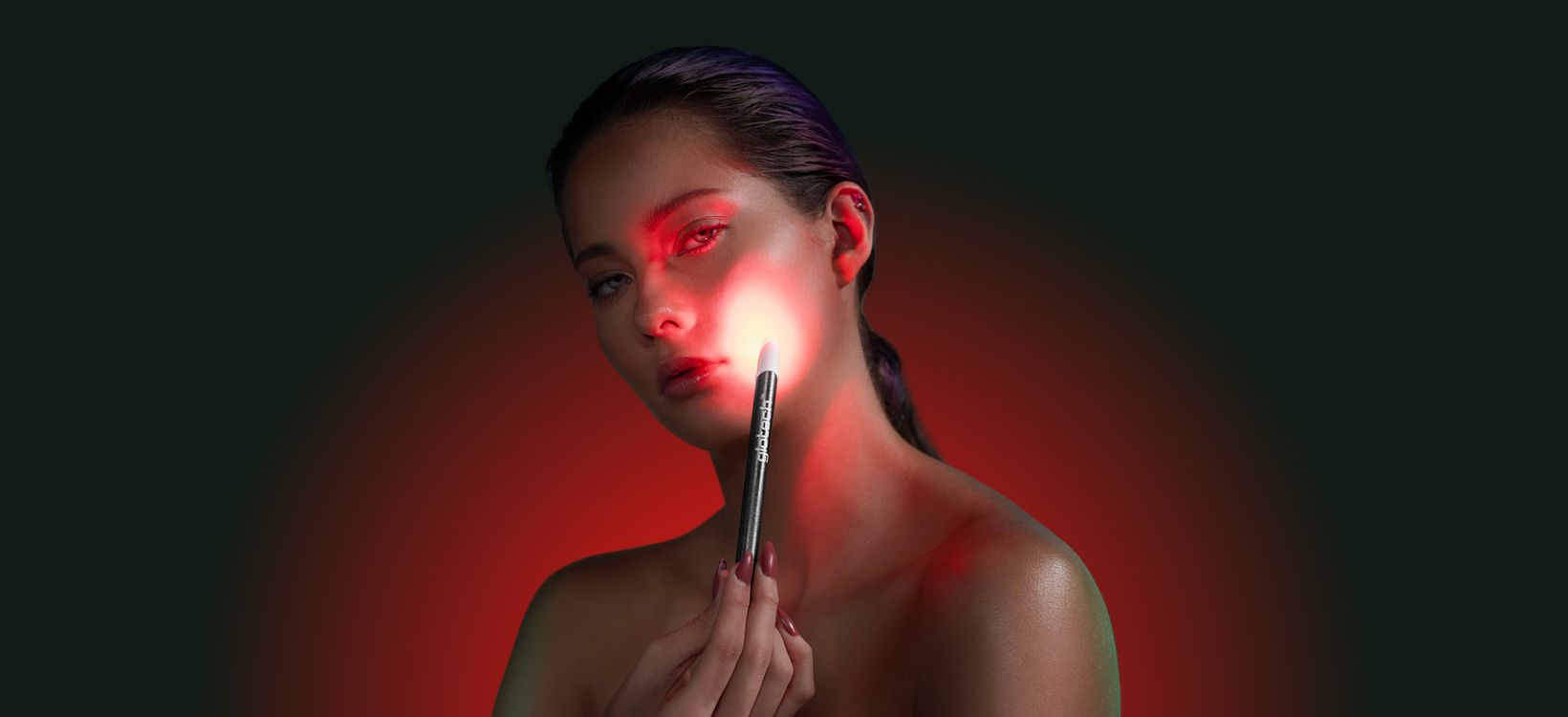 Woman using Glotech™ Acne Wand